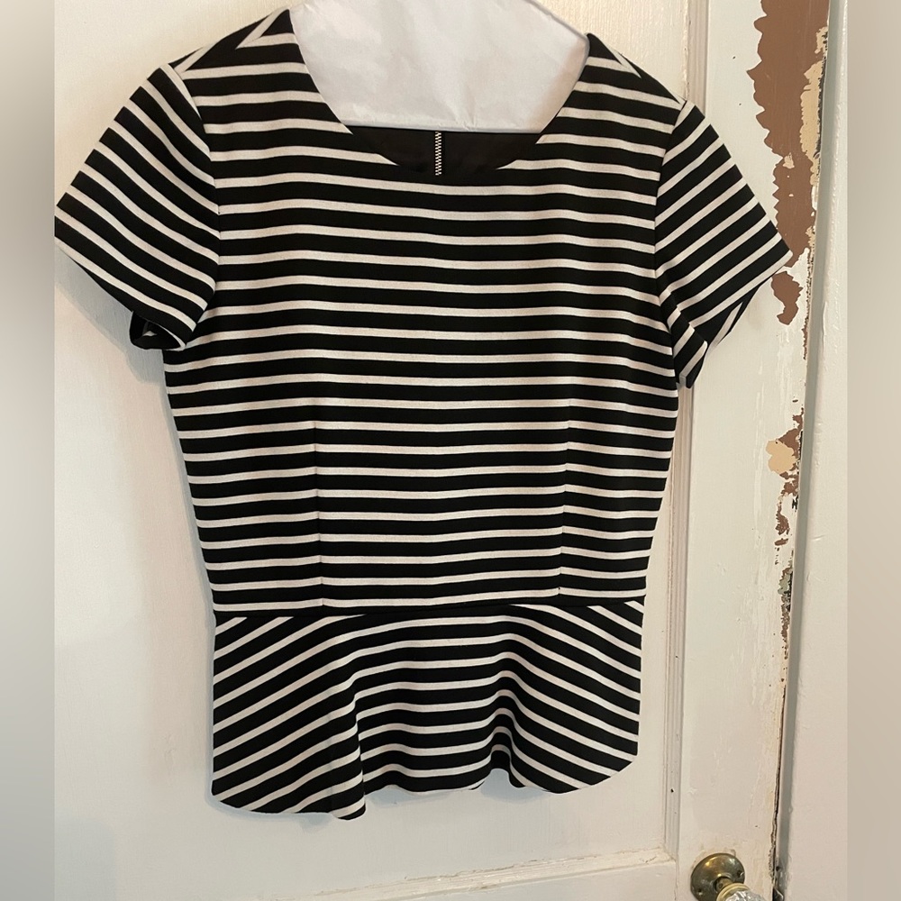 Peplum black and white top